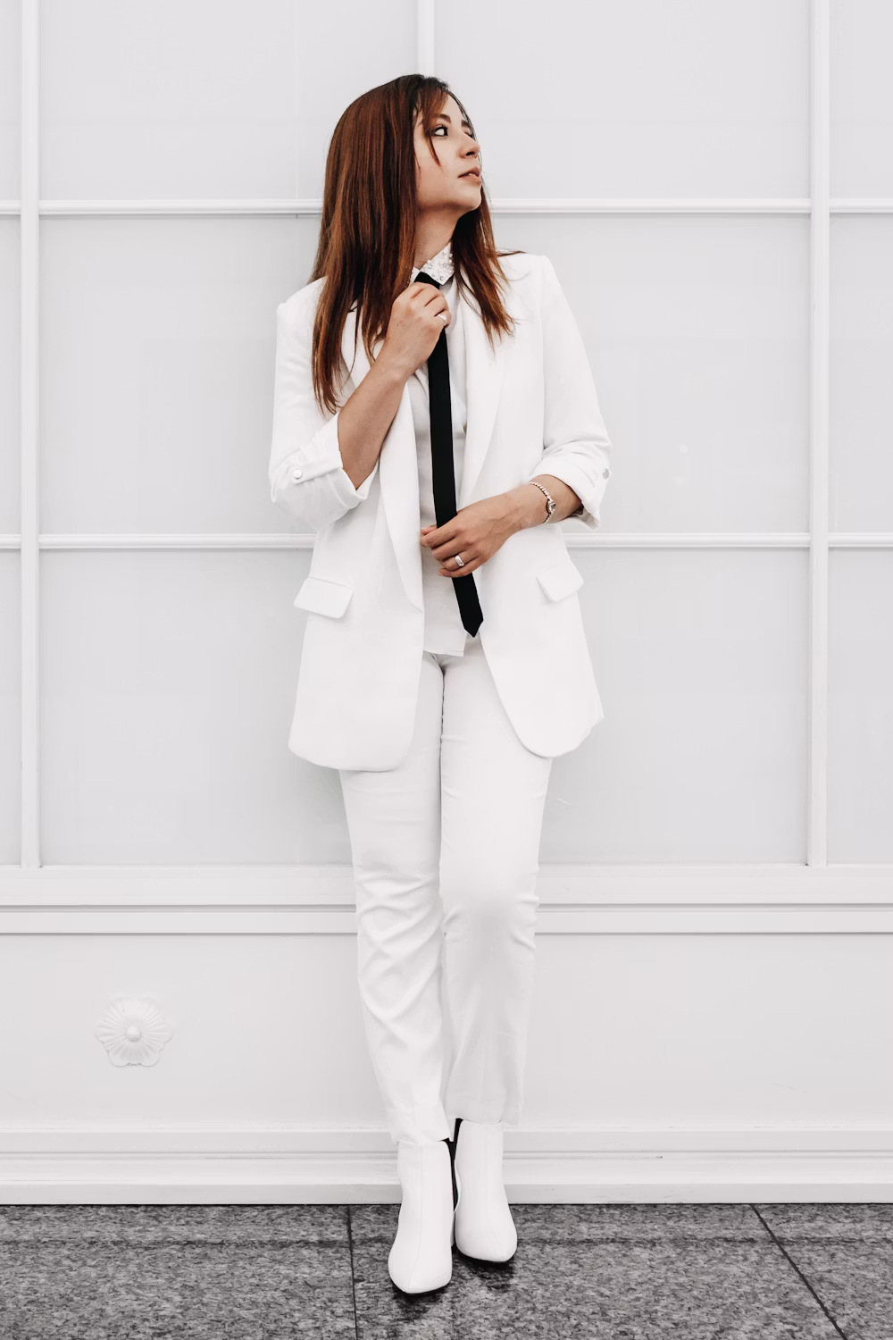 Woman in white suit portrait